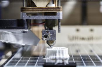 3D printer building a prototype part